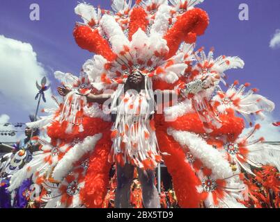 PORT OF SPAIN, TRINIDAD - Mardi Gras dancer in costume during Trinidad and Tobago Carnival parade. Stock Photo