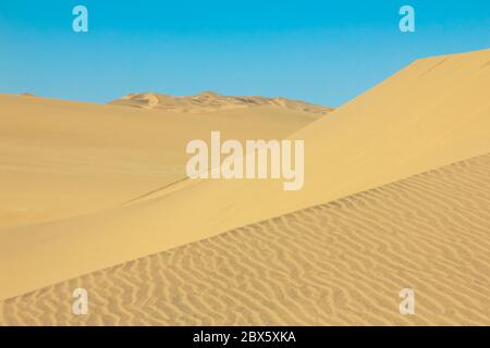 Big sand dunes panorama. Desert and coastal beach sand landscape scenery. Abstract background. Stock Photo