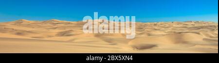 Big sand dunes panorama. Desert and coastal beach sand landscape scenery. Abstract background. Stock Photo