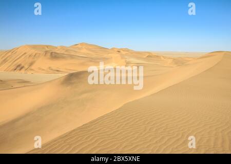 Big sand dunes panorama. Desert and coastal beach sand landscape scenery. Abstract background. Stock Photo