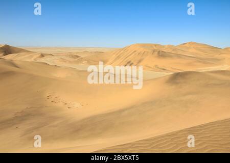 Big sand dunes panorama. Desert and coastal beach sand landscape scenery. Abstract background. Stock Photo