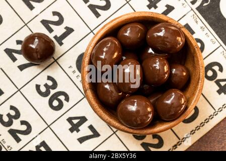 Chocolate Covered Peanuts in a Bowl Stock Photo