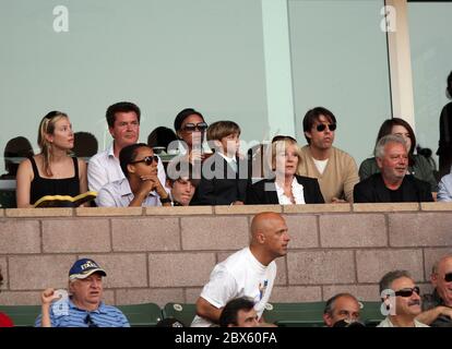 Tom Cruise greets Victoria Beckham as they watch David Beckham's return to the Los Angeles Galaxy soccer team in an international friendly versus AC Milan at the Home Depot Center, Carson, California. 19th July 2009 Stock Photo