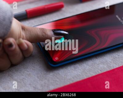 In-display fingerprint sensor of new phone stock image. Stock Photo