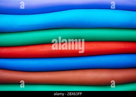 Colorful plasticine lines background. Close up. Stock Photo