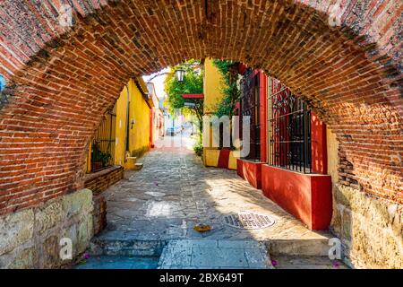 arch and alley in the old town of Oaxaca Stock Photo