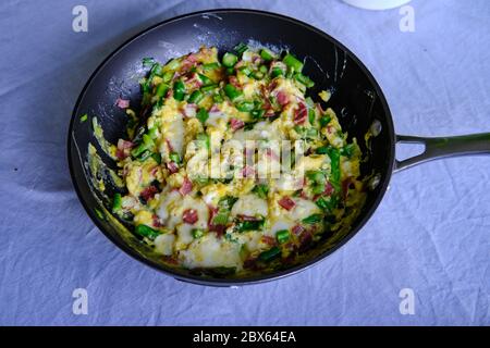 Fritata with asparagus, bacon and spring onions. Stock Photo