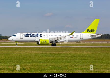 Stuttgart, Germany - September 15, 2019: Air Baltic Airbus A220-300 airplane at Stuttgart airport STR in Germany. Stock Photo