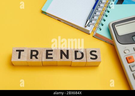 The word TRENDS on wooden cube block. Concept. Stock Photo