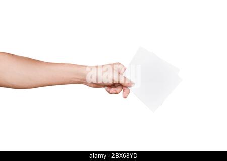 Hand holding pieces of paper (cards, tickets, flyers, invitations or coupons, ), Isolated on white background with clipping path. Stock Photo
