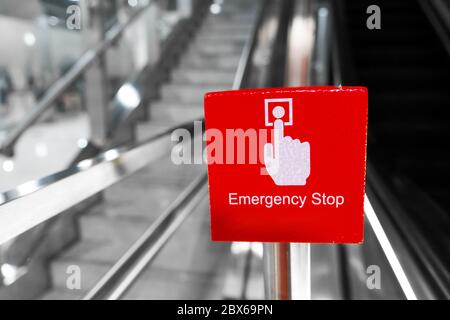 Big red escalator emergency stop button close up. Stock Photo