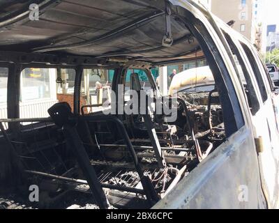 Interior View of Burned out NYPD Vehicle during Protest, University Place and 12th Street, New York City, New York, USA, May 2020 Stock Photo