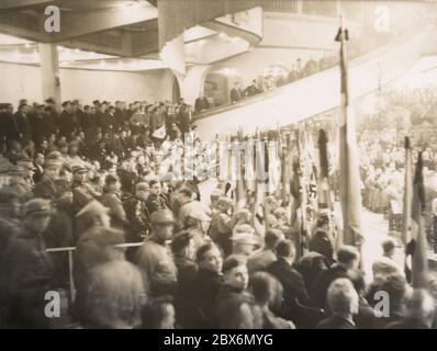 Rally in the Berlin Sportpalast. Heinrich Hoffmann Photographs 1933 Adolf Hitler's official photographer, and a Nazi politician and publisher, who was a member of Hitler's intimate circle. Stock Photo