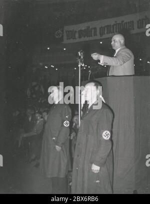 NSBO Chairman Engel speaks Heinrich Hoffmann Photographs 1933 Adolf Hitler's official photographer, and a Nazi politician and publisher, who was a member of Hitler's intimate circle. Stock Photo