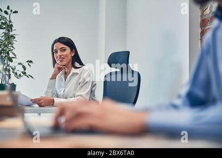 Young creative managers working in modern office Stock Photo