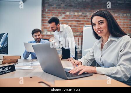 Young colleagues working on startup project in modern office Stock Photo