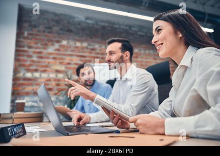Managers are working in meeting room together Stock Photo