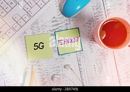 Handwriting text writing 5G Technology. Conceptual photo highspeed mobile Internet, new generation wireless system networks Writing equipment and comp Stock Photo