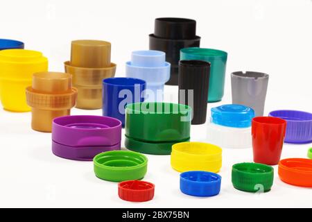 Recycling. Different shaped and colored caps from bottles, containers, creams and pastes. Stock Photo