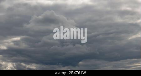 Dark clouds before a thunderstorm. Weather forecast, storm. Stock Photo
