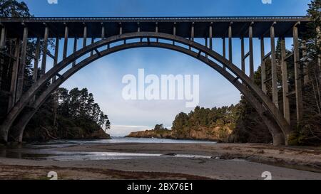 View of the  Russian Gulch Bridge, reinforced concrete open-spandrel deck arch bridge on California State Highway 1, at the Russian Gulch State Park, Stock Photo