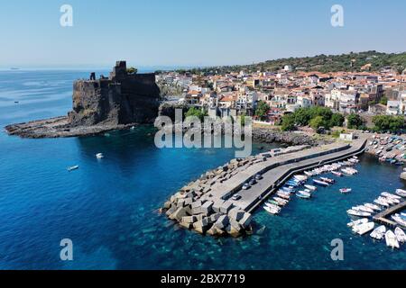 Acicastello sea in summer season in aerial view  from above- Sicily travel Stock Photo