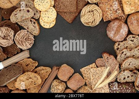 High fibre health food background border with foods high in minerals, vitamins, smart carbs & with low GI. Helps to lower blood pressure & cholesterol Stock Photo