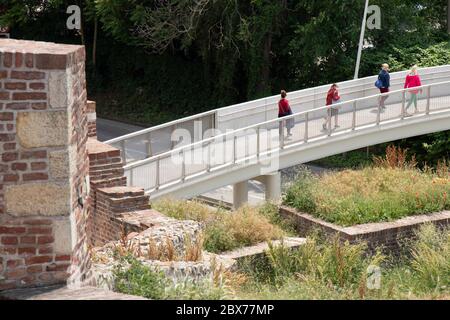 Belgrade, Serbia - May 21, 2020: People walking on a recently build pedestrian bridge that connects Kalemegdan fortress with promenade on river Sava, Stock Photo