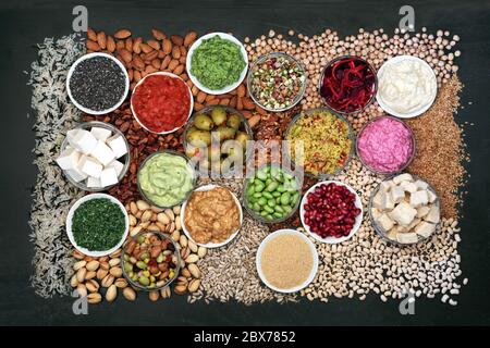 Immune boosting vegan health food collection with foods high in protein, smart carbs, anthocyanins, vitamins,  antioxidants, omega 3 and fibre. Stock Photo