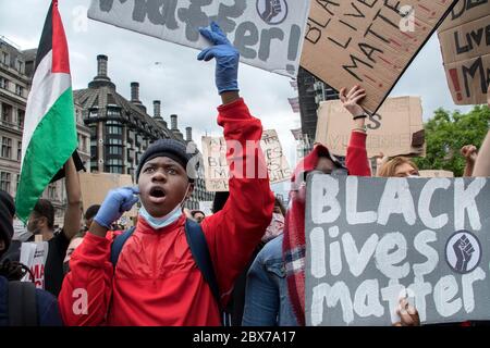 Protesters marching in London, as part of the Black Lives Matter protests, protesting the death of George Floyd in the Us / 07-06-2020 Stock Photo