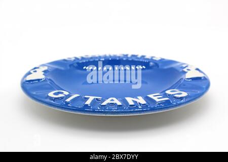 Ceramic ashtray with Gitanes, isolated on a white background, close up Stock Photo