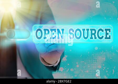 Writing note showing Open Source. Business concept for contains the source code that can be modified and enhanced Stock Photo
