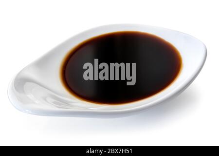 Dish of oy sauce, isolated on white. Stock Photo