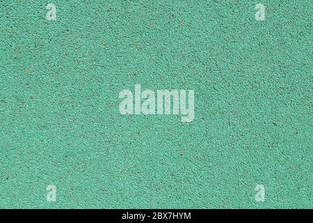 green textured background of small stones covering Stock Photo