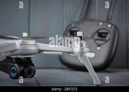 Side view of quad-engine drone with high-resolution camera and radio control with dual frequency for capturing aerial images Stock Photo