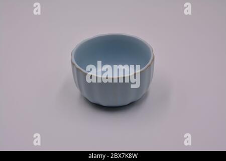 The light blue cup made of ceramic on white background Stock Photo