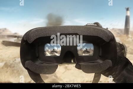 First person view soldier hand in black battle gloves & tactical jacket using vr glasses on desert tank war scene with health & armor indicator. Stock Photo