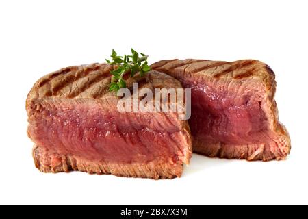 Filet mignon, char-grilled to medium rare.  Isolated on white. Stock Photo