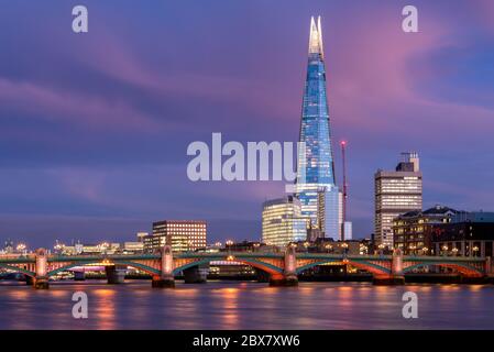 Colorful Sunset View in London With Southwark Bridge and the Shard Stock Photo