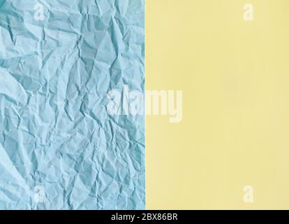 blue crumpled and yellow smooth paper texture Stock Photo