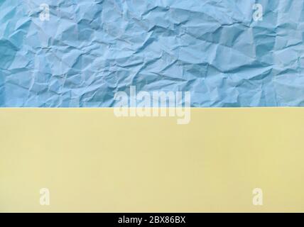 blue crumpled and yellow smooth paper texture Stock Photo