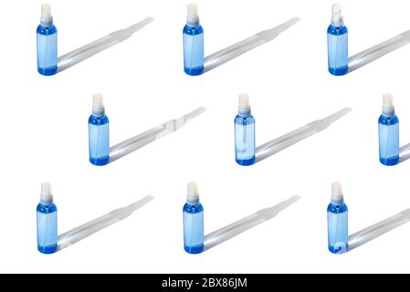 Pattern with hand sanitizer bottles, blue plastic containers with a disinfectant on a white background Stock Photo