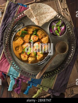 Rajasthani Gatta curry. Gram flour dumplings in yogurt sauce. India Food Stock Photo