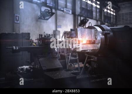 Milling mechanical turning metal working process metal parts. Stock Photo