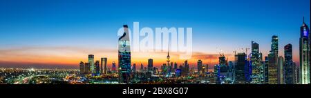 Kuwait City, 7Jan2020 - Panorama at dusk showing Kuwait city skyline buildings and ring road, Golden Spiral Stock Photo