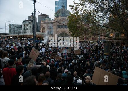 Melbourne, Australia. 06th June, 2020. Some of the thousands of protester outside Flinders Street Station Melbourne Australia at the conclusion of the Stop Black Deaths in Custody - Justice for George Floyd protest that was held in defiance of government orders. 06 Jun 2020 Credit: Michael Currie/Alamy Live News Stock Photo