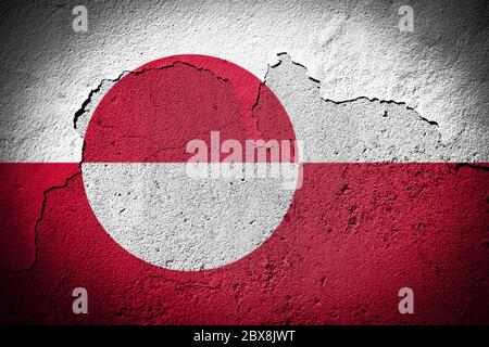 Flag of Greenland painted on cracked dirty wall. National pattern on ...