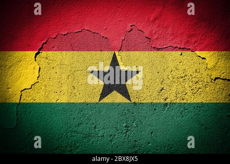 Ghana flag painted on grungy cracked wall Stock Photo