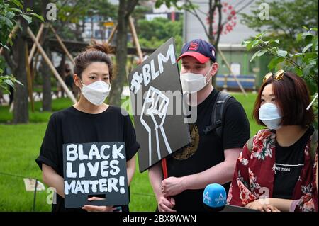 Seoul, South Korea. 06th June, 2020. Demonstrators hold signs in support of the Black Lives Matter movement in downtown Seoul on Saturday, June 6. A small demonstration took place in the South Korean capital over the death in U.S. police custody of George Floyd. Photo by Thomas Maresca/UPI Credit: UPI/Alamy Live News Stock Photo