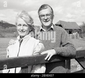 Portrait of Kenneth Baker MP /  Baron Baker of Dorking posing with his wife Mary.  April 1987. Stock Photo